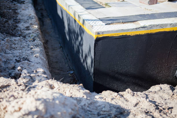 Professional Waterproofing technician working in Topeka, IN